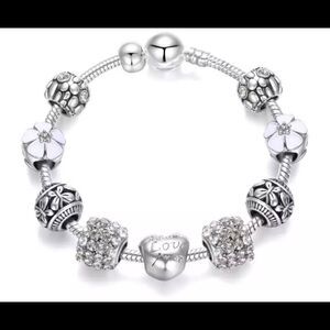 TRENDY WHITE 9 PIECE CHARM BRACELET